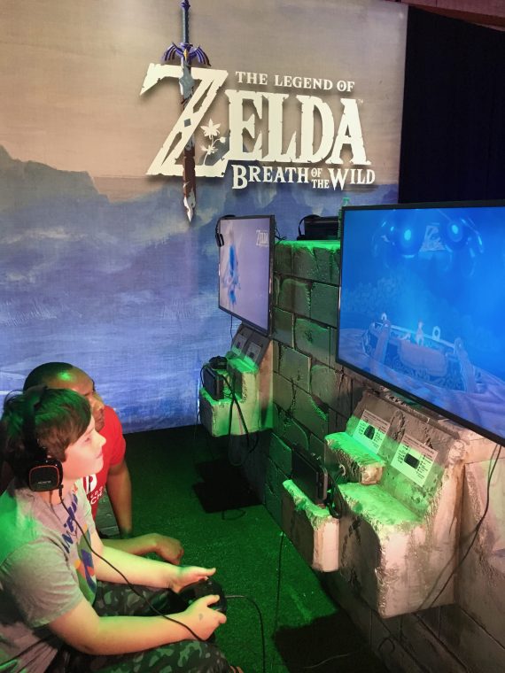Boy playing Legend of Zelda Breath of the Wild